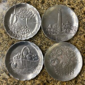 Wendell August Set of Four Silver Collectible Hammered Decorative Metal Plaques